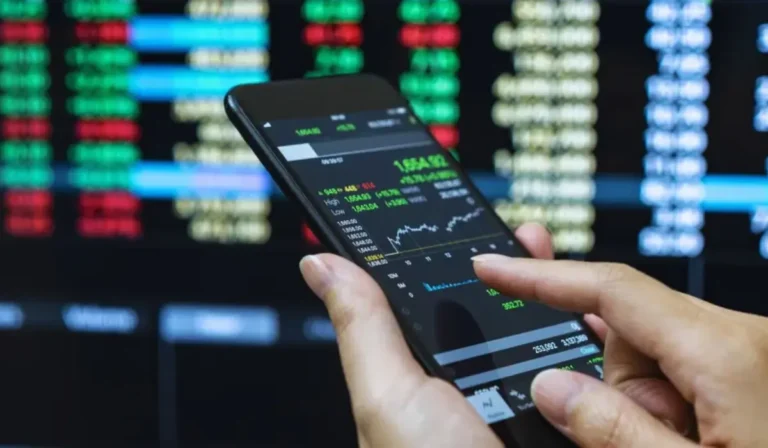 Illustration moderne d’un trader analysant des graphiques financiers sur plusieurs écrans